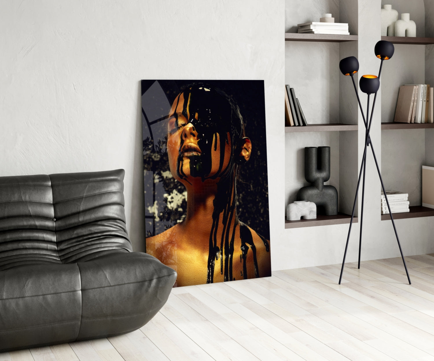Modern living room interior featuring stained glass wall art depicting a golden-lit portrait with black geometric patterns against dark background.