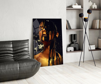 Modern living room interior featuring stained glass wall art depicting a golden-lit portrait with black geometric patterns against dark background.