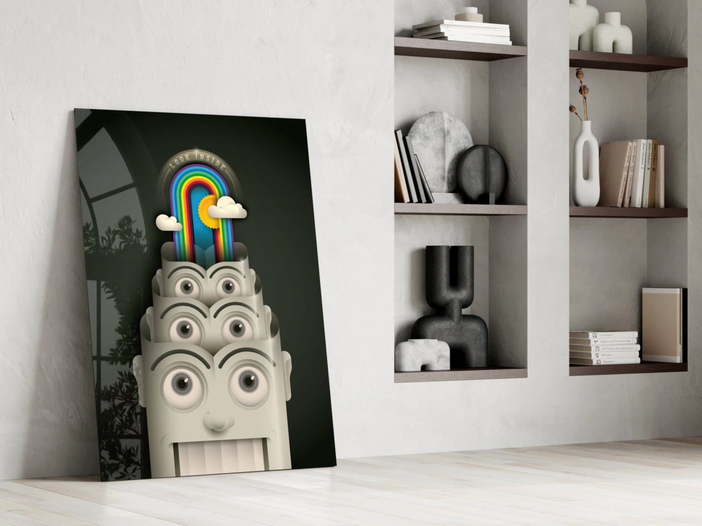 Surreal glass art leaning against white wall shows cream-colored head with multiple eyes topped by colorful rainbow and clouds on dark background.