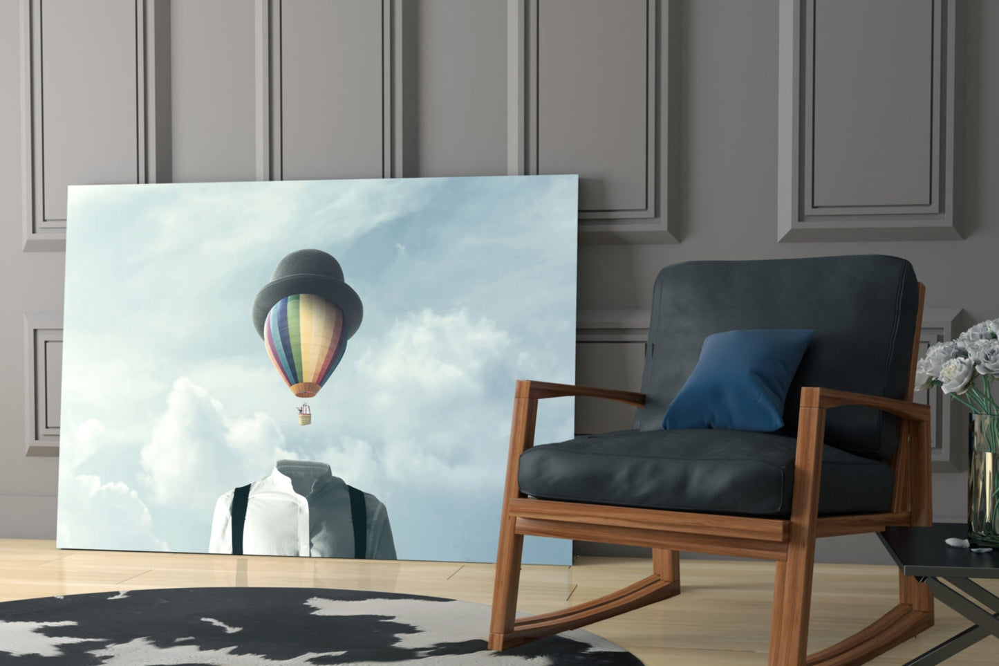 Glass wall art displaying a figure in white shirt and bowler hat with a colorful hot air balloon floating above cloudy sky.