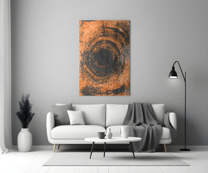 Copper Spiral Swirl Glass Wall Art displayed above a white sofa in a minimalist living room setting with gray accents.