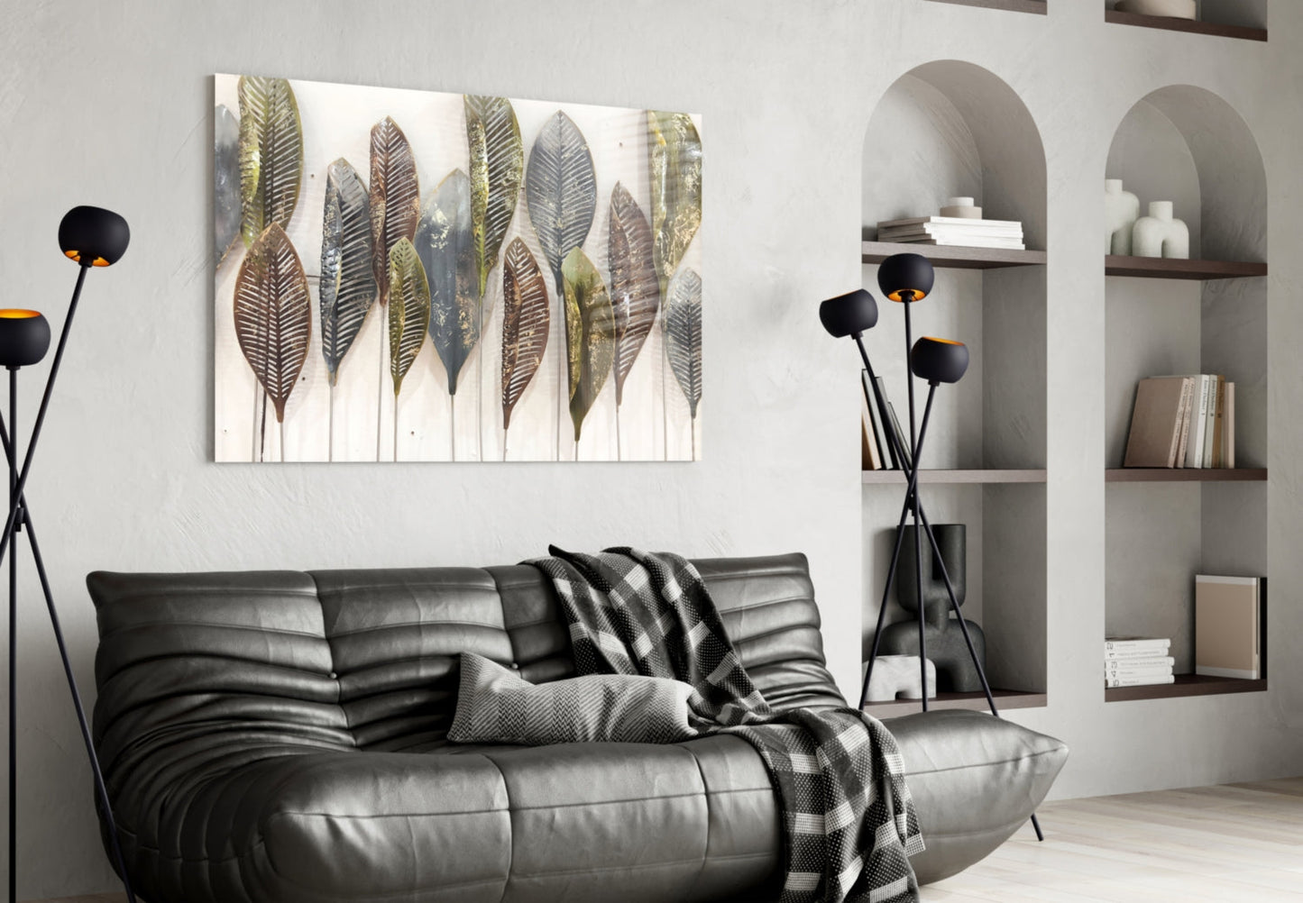 Modern living room with feathered glass wall art above black leather sofa and curved shelving unit.