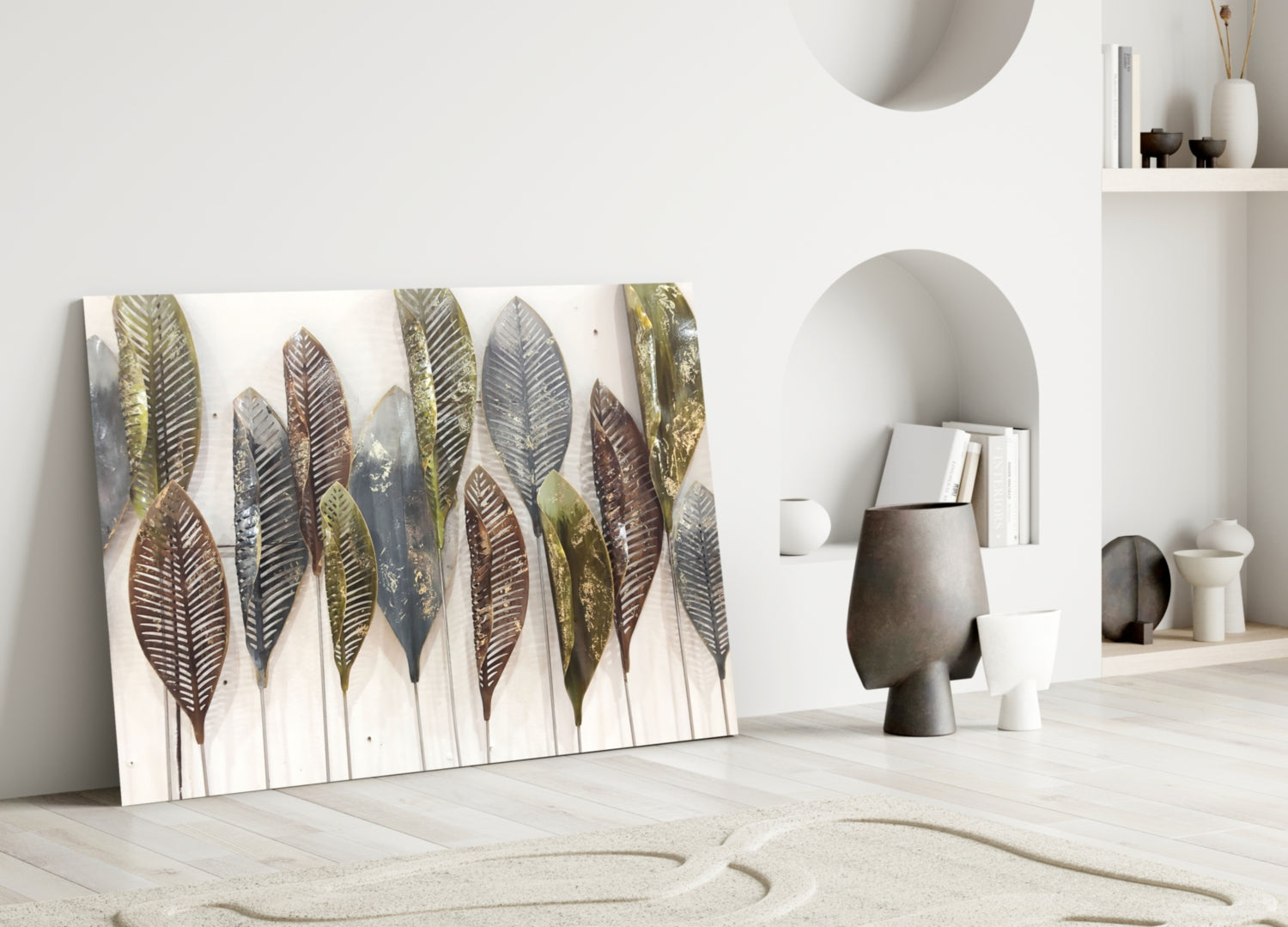 Glass wall art featuring metallic feathers in gold, brown, and gray tones displayed against white interior wall with shelving and decorative objects.