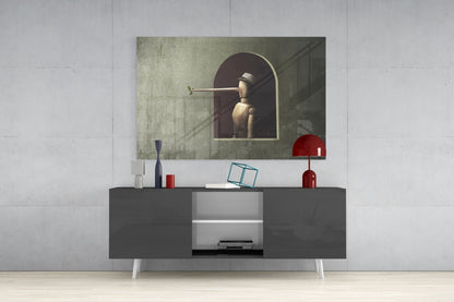 Pinocchio Glass Wall Art displayed above gray media console with white center shelving, red decorative objects, and blue geometric sculpture.