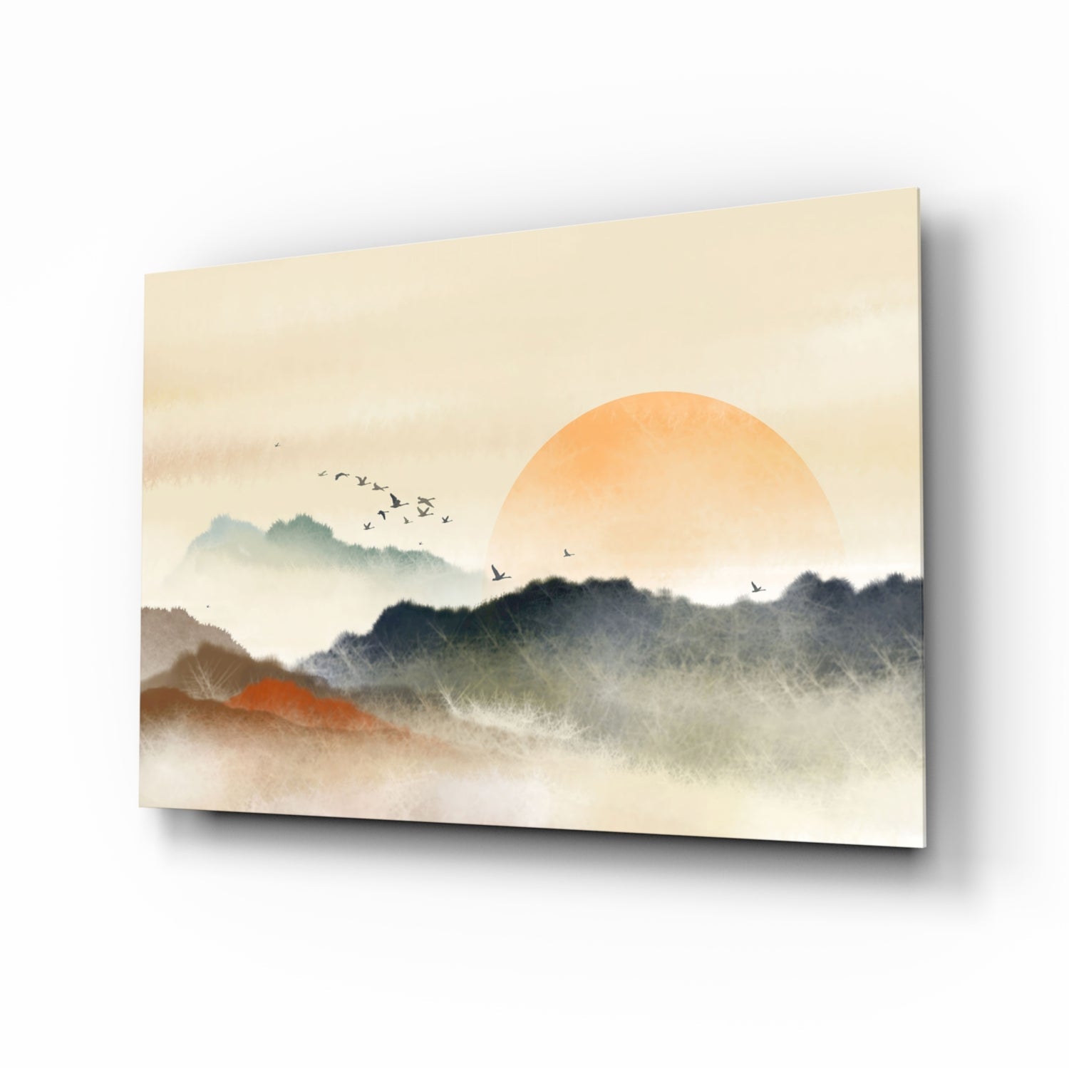 Abstract landscape glass wall art displaying a golden sun over misty layered mountains with flying birds and warm earth tones.