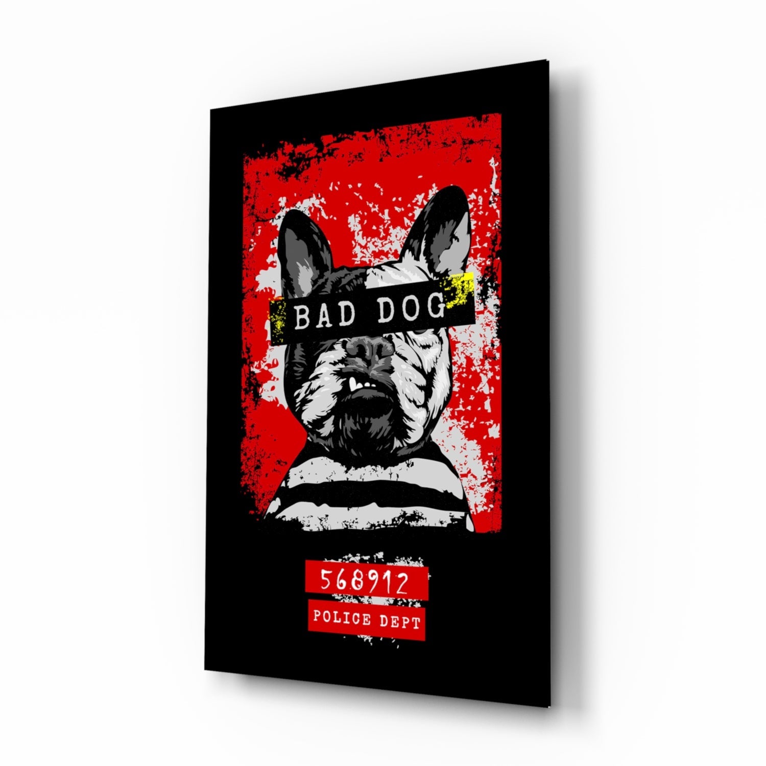 Angled three-quarter view of black glass wall art featuring red background, black and white French Bulldog with "BAD DOG" text banner, and "568912 POLICE DEPT" labels below.