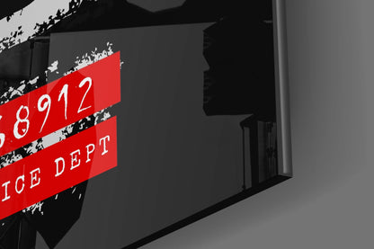 Red neon sign with white text reading "8912" and "ICE DEPT" mounted on dark architectural building exterior.