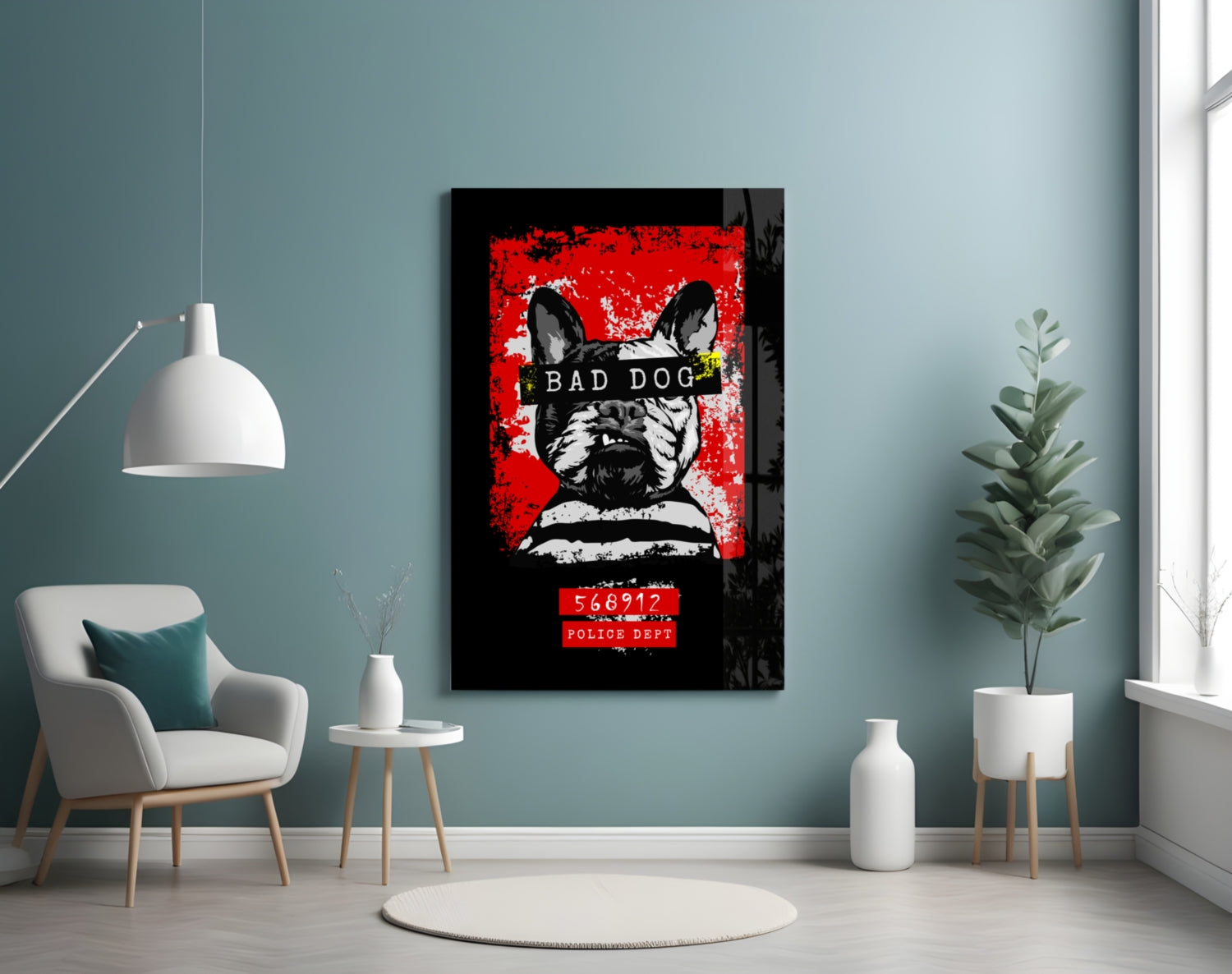 Bad Dog" glass wall art displaying a black and white French Bulldog with sunglasses on vibrant red background, hung in modern living room with teal walls.