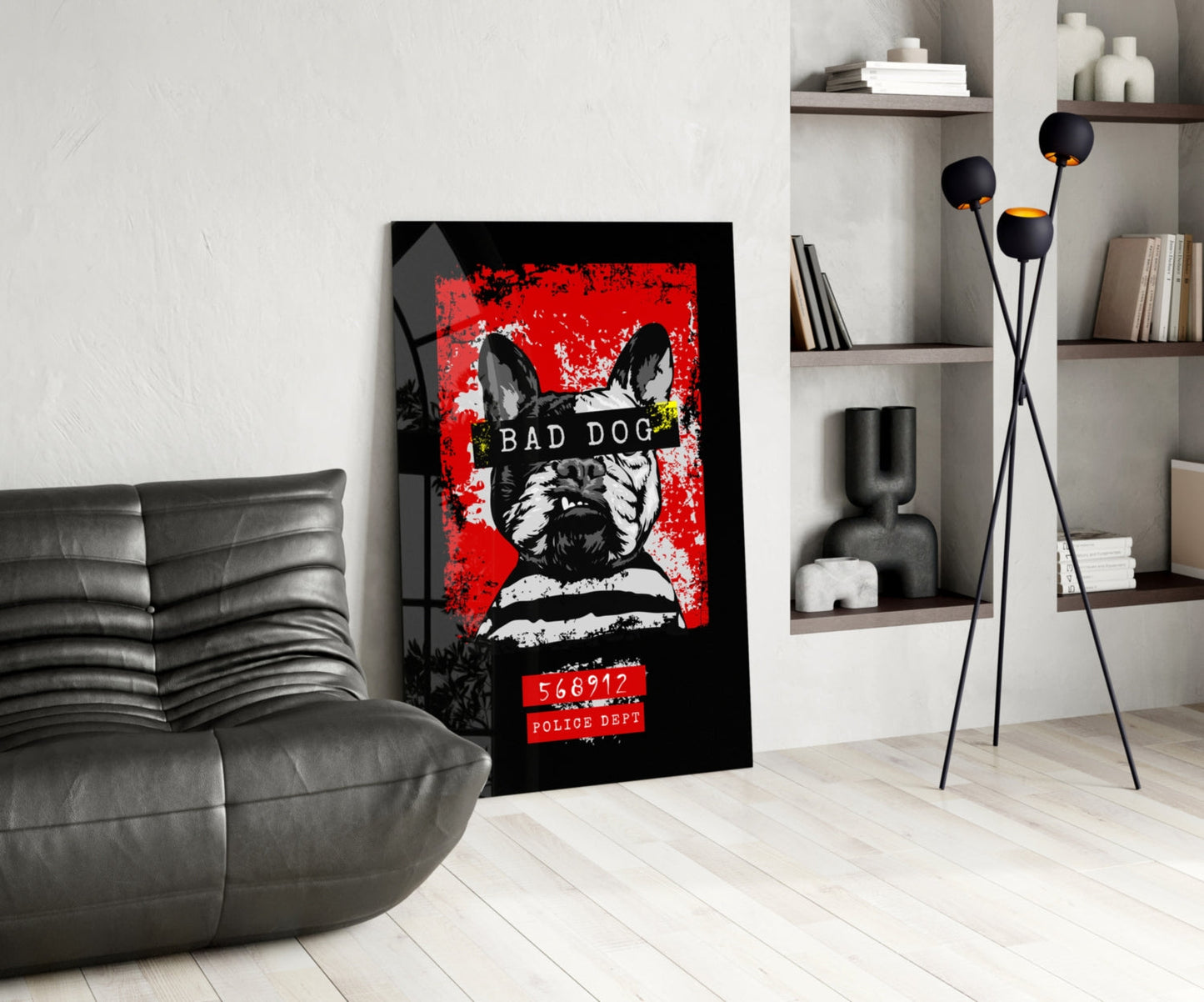 Bad Dog" glass wall art displaying a black and white French Bulldog mugshot with red background and police dept text, positioned in modern living room interior.