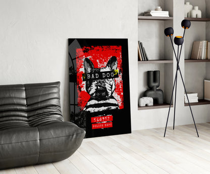 Bad Dog" glass wall art displaying a black and white French Bulldog mugshot with red background and police dept text, positioned in modern living room interior.