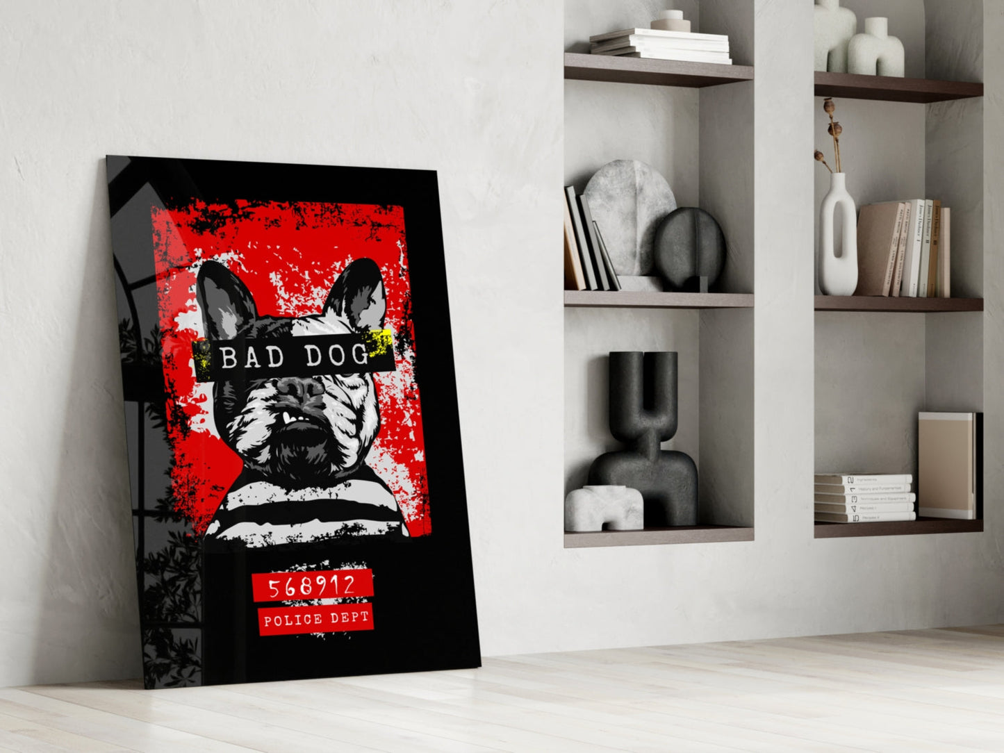 Bad Dog" glass wall art leaning against white wall displays black and white dog with red background, police badge number and text.