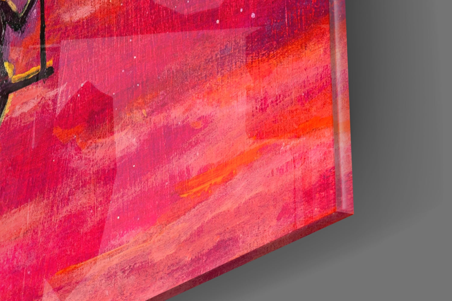 Close-up edge view of vibrant red and orange gradient glass art panel with textured surface and dimensional depth.