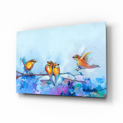 Four colorful birds perched on a blue branch against a light blue sky with vibrant purple and pink foliage below, rendered in watercolor style on glass.