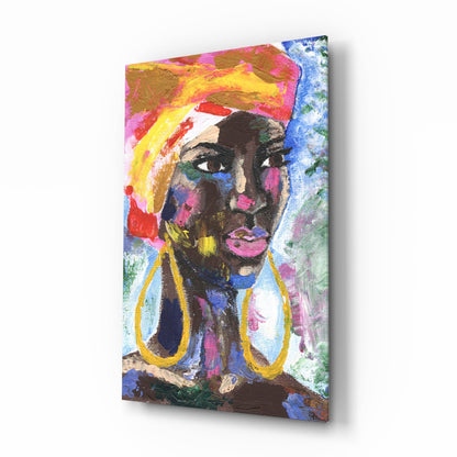 Colorful abstract portrait of a woman with vibrant yellow, pink, and blue paint strokes on glass, displayed at an angle against white background.