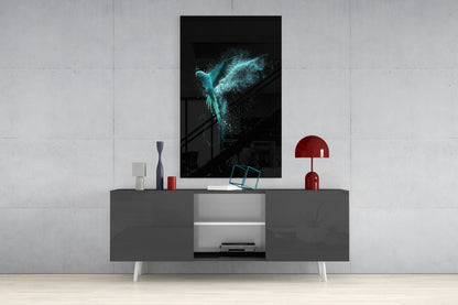 Luminous turquoise parrot artwork displayed above gray media console with red lamp and white accessories in modern interior setting.
