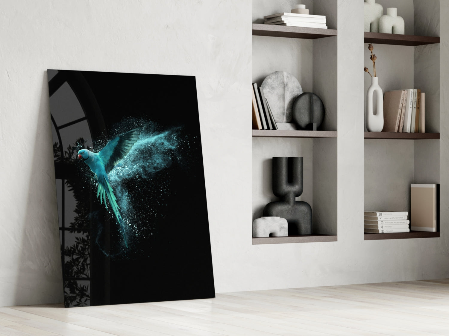 Luminous Parrot Glass Wall Art leaning against white wall beside styled shelving with decorative objects and books.