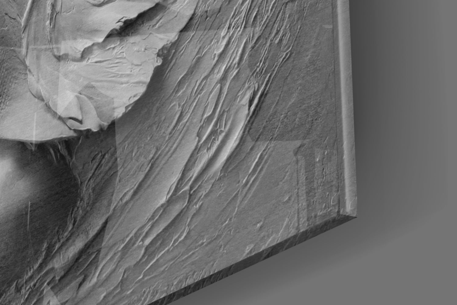 Close-up detail of relief glass wall art showing textured surface with flowing linear patterns and dimensional sculptural elements in grayscale.