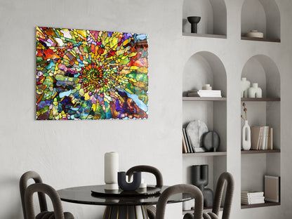 Vibrant stained glass mosaic artwork with yellow, blue, red, and green geometric patterns displayed above a round black dining table with upholstered chairs.
