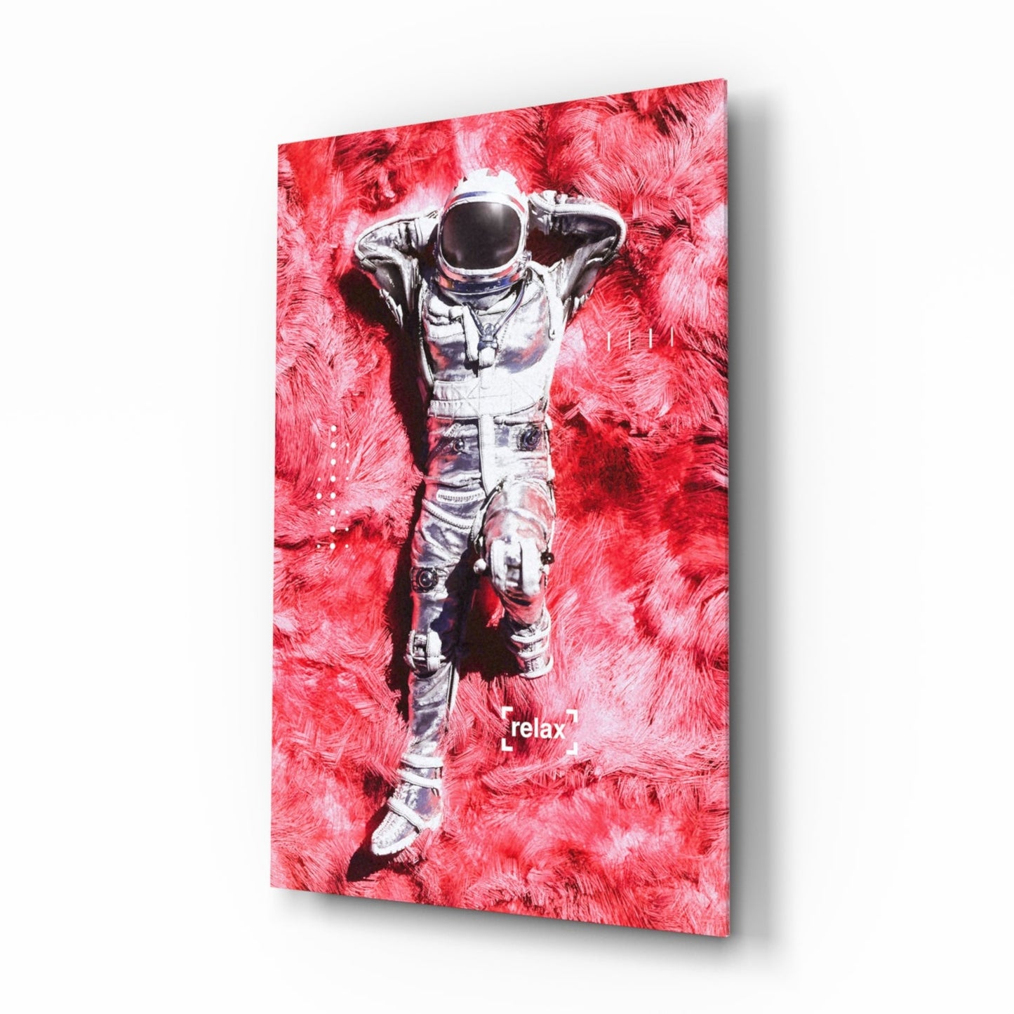 Glass art panel displaying an astronaut in white spacesuit against vibrant red textured background with "relax" text at bottom.