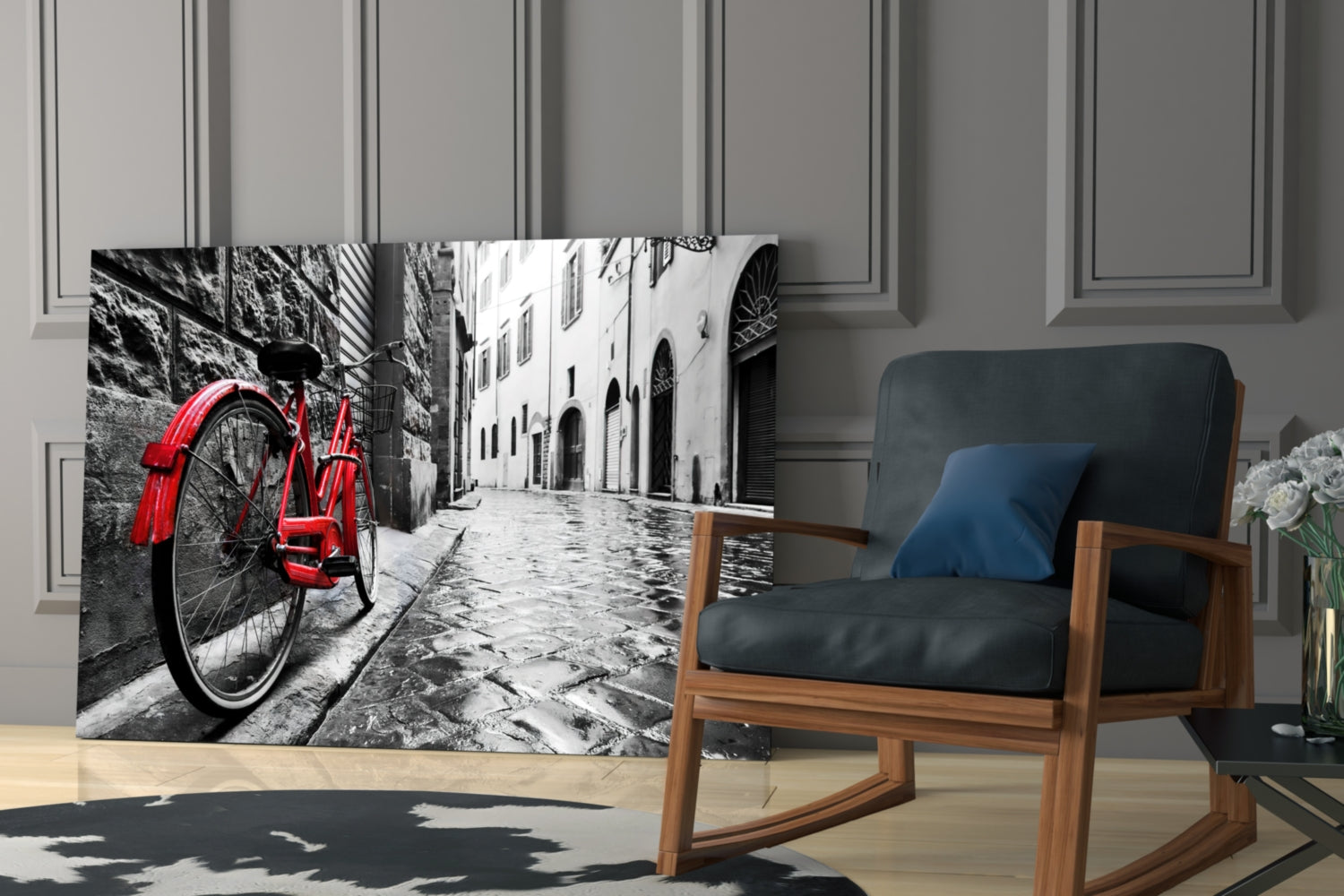 Red bicycle leaning against stone wall in black and white European street scene displayed as glass art panel in modern living room.