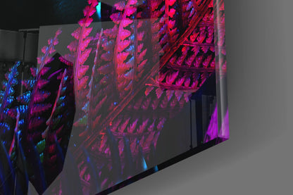 Neon Glances Glass Art illuminated with vibrant magenta, pink, and blue neon lights casting reflections on translucent glass panels.