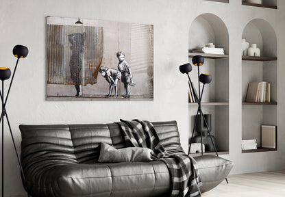 Modern living room with black leather sofa, arched wall alcoves, black floor lamp, and framed street art print above furniture.