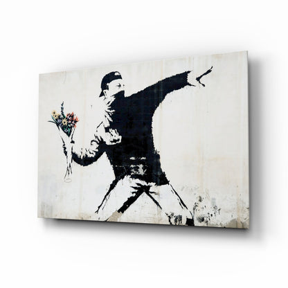 Stenciled glass art depicting a silhouetted figure throwing a colorful flower bouquet, displayed at an angle against a white background.