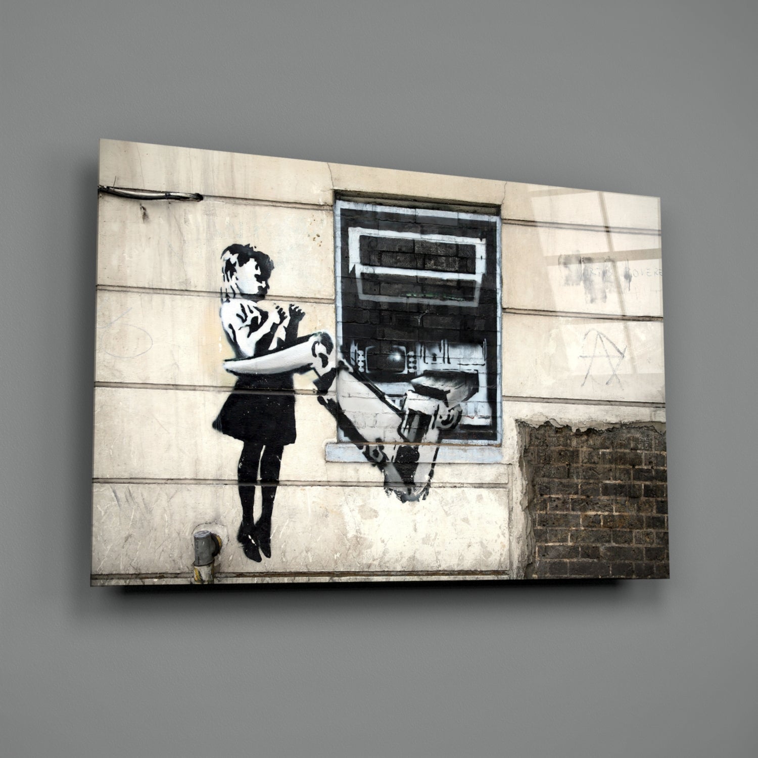 Canvas print of stenciled street art depicting a young girl operating an ATM machine on weathered concrete wall.