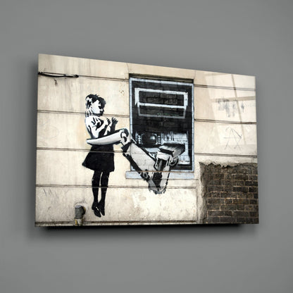 Canvas print of stenciled street art depicting a young girl operating an ATM machine on weathered concrete wall.