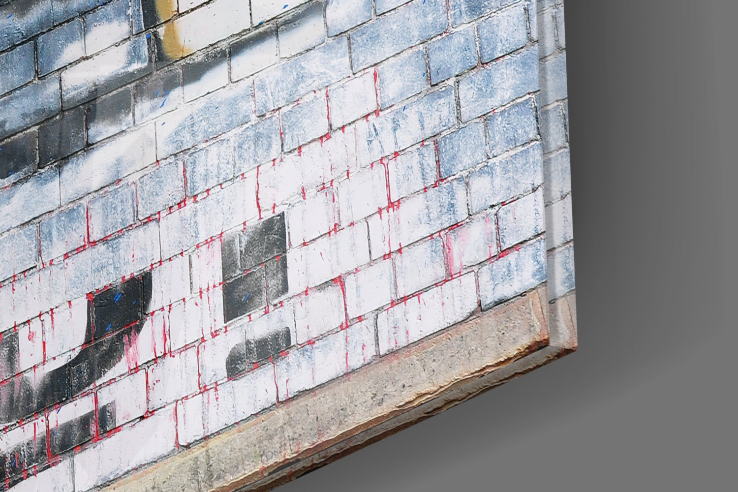 Brick wall with white-painted bricks, red mortar lines, and dark rectangular sections with blue markings, angled perspective view.