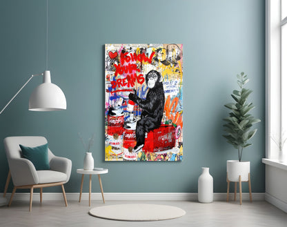 Colorful pop art glass panel featuring a thinking chimpanzee surrounded by red graffiti text and Campbell's soup cans displayed in modern room setting.