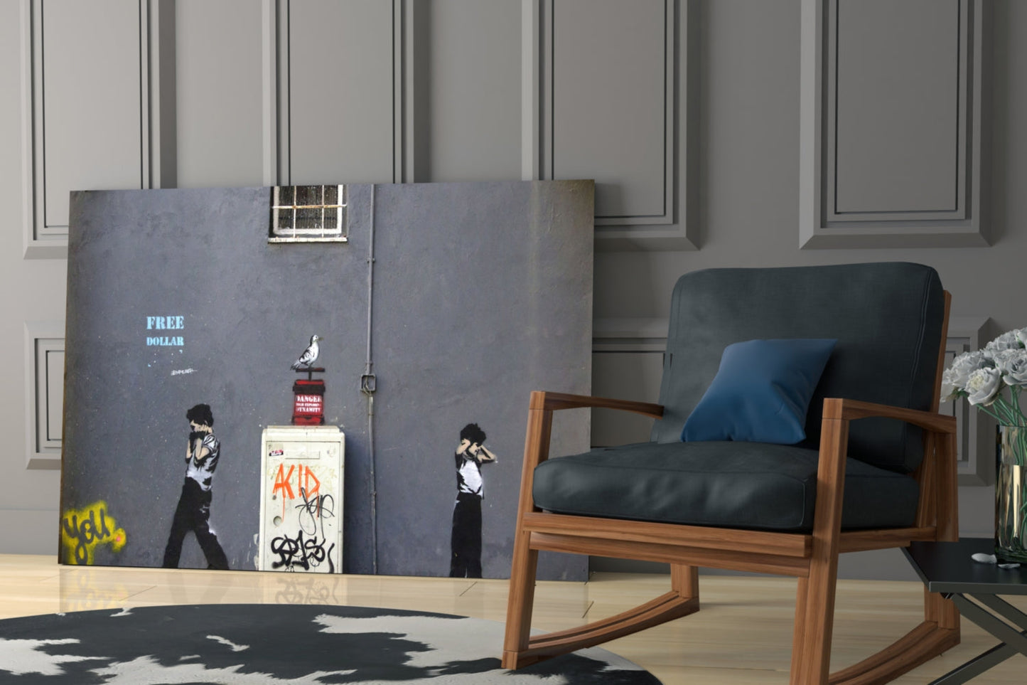Modern interior with dark blue-grey Banksy-style street art glass panel featuring "FREE DOLLAR" text and stenciled figures displayed against paneled wall next to wooden chair.