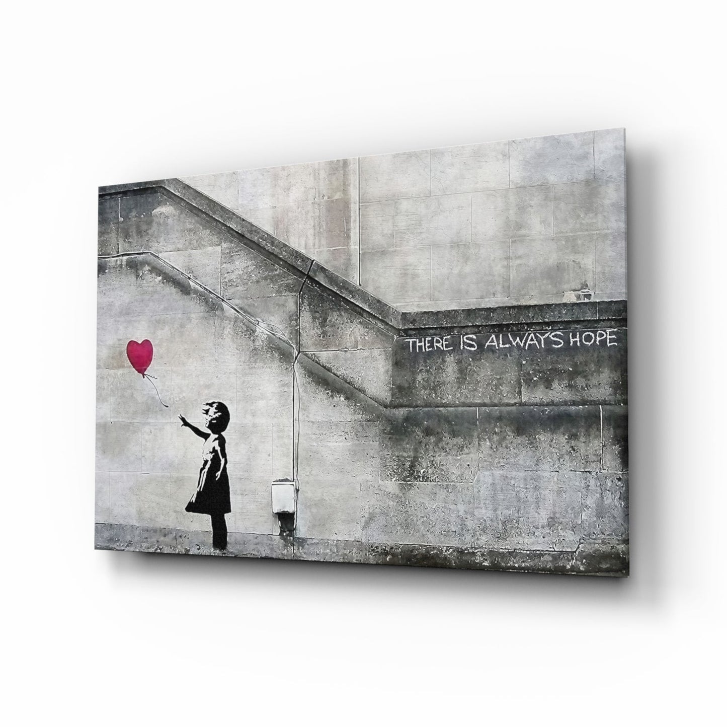 Glass art canvas displaying silhouetted girl releasing red heart balloon with "There is Always Hope" text on concrete stairwell background.