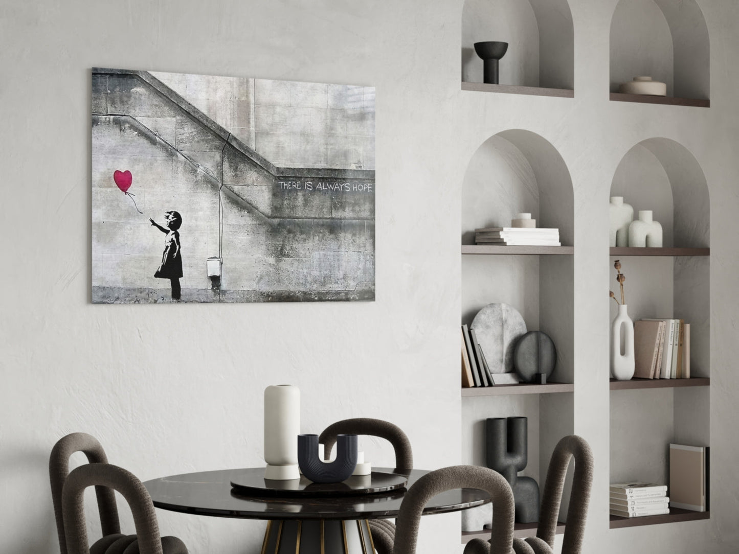 Flying Heart Glass Art canvas print displayed on white wall above dining table in minimalist interior with shelving.