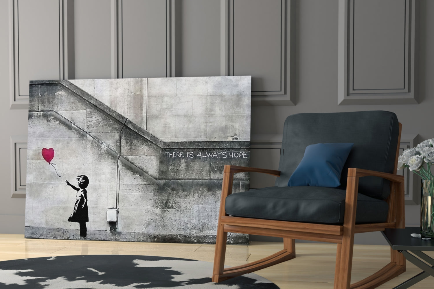 Banksy-style glass art featuring silhouetted girl releasing red heart balloon displayed in modern living room next to wooden chair.