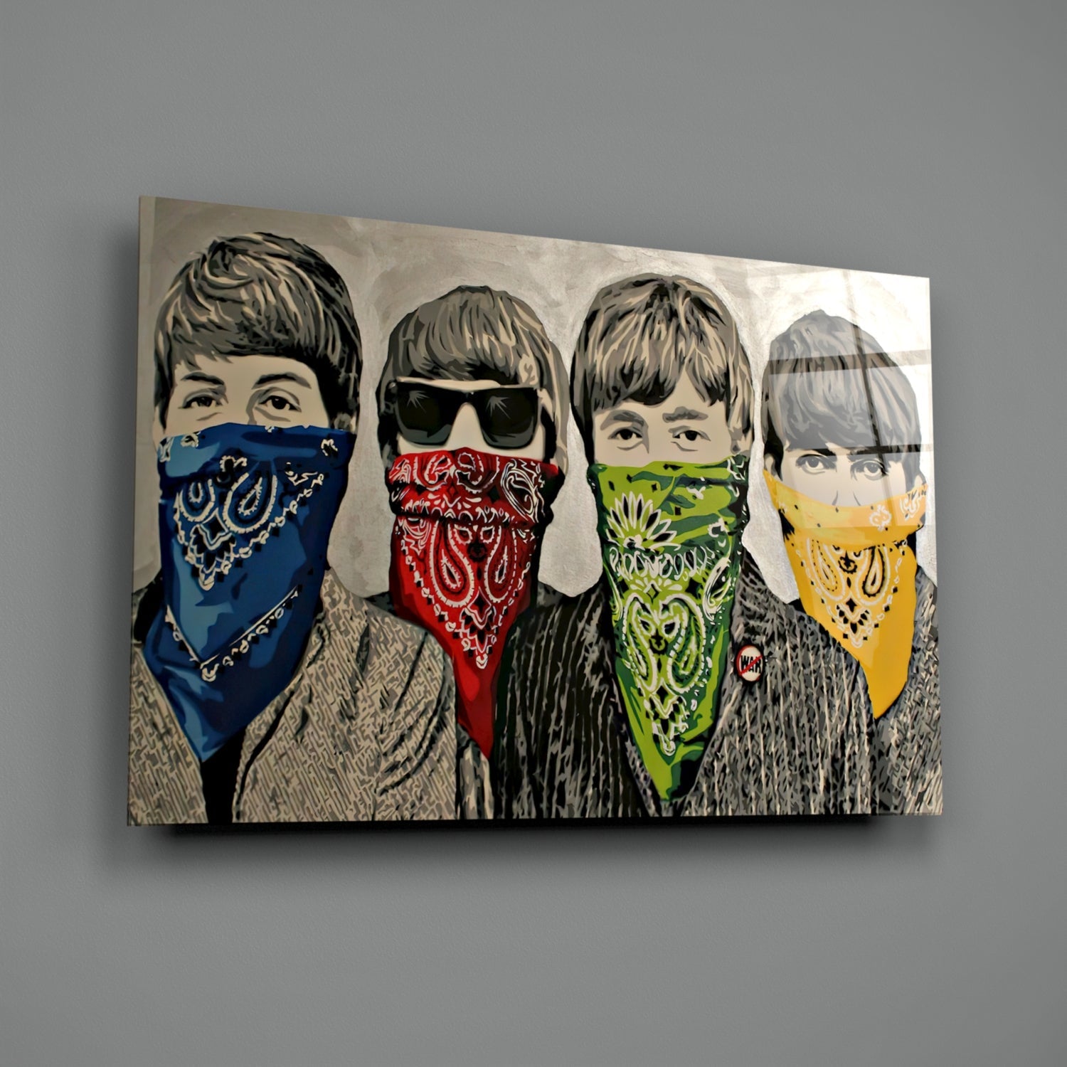 Four illustrated figures wearing colorful bandanas in blue, red, green, and yellow against a gray background on glass art.