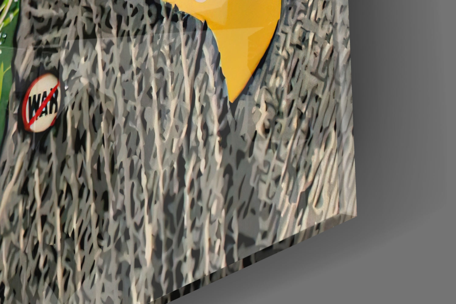 Close-up of textured gray glass surface with red circular "WAR" logo and yellow geometric shape visible.