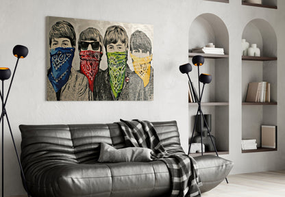 Modern living room with black leather sofa displaying pop art canvas of four youths wearing colorful bandanas above it.