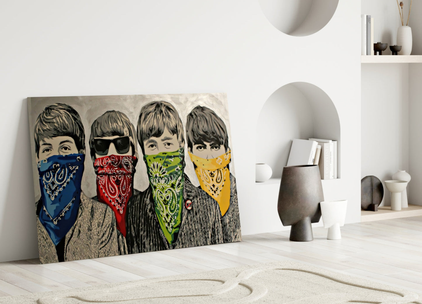 Four figures with 1960s-style haircuts wearing colorful bandanas in blue, red, green, and yellow displayed on canvas in minimalist white interior setting.