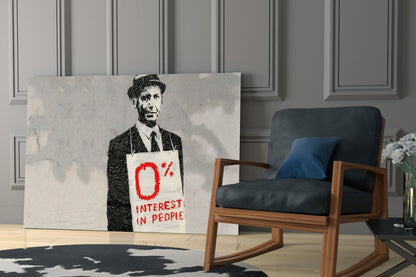 Canvas print depicting stenciled man in suit wearing sign reading "0% Interest in People" displayed in modern living room setting.