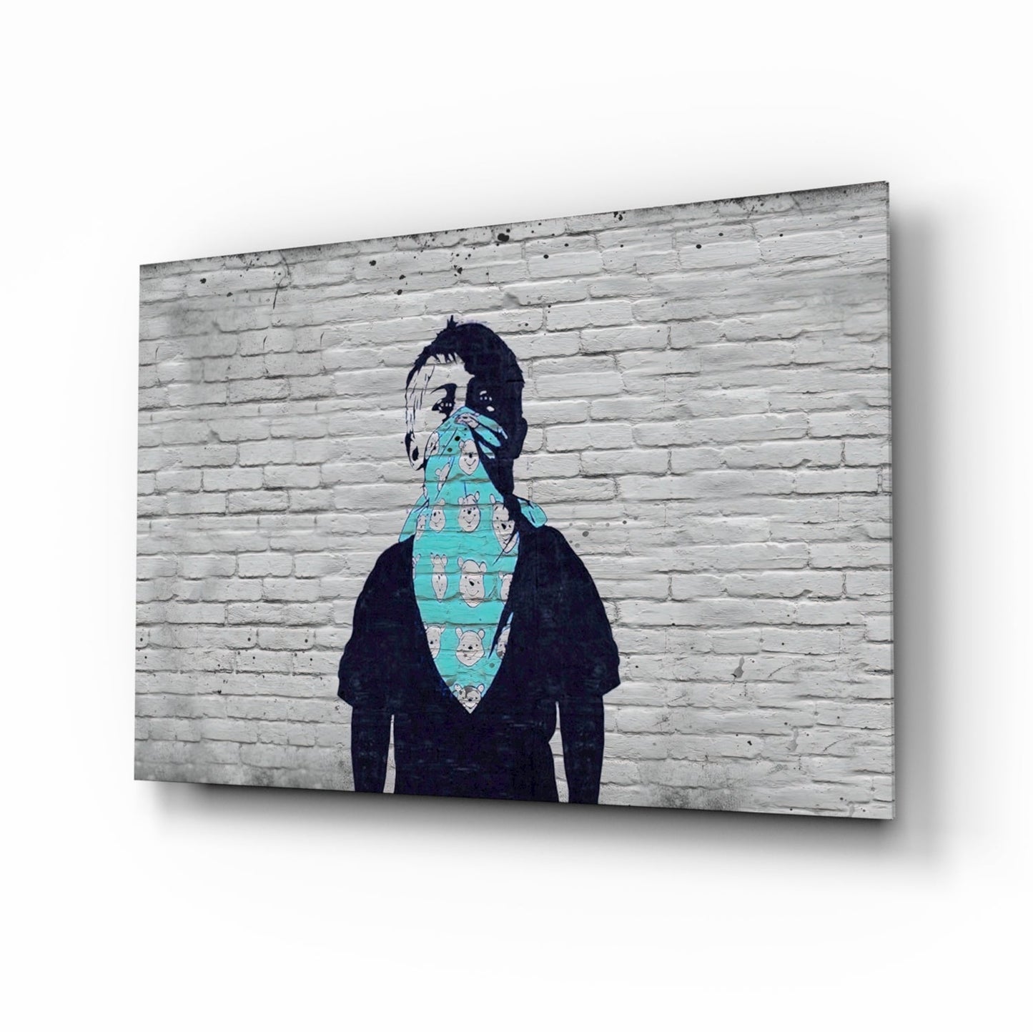 Street art mural on white brick wall depicting figure with turquoise bandana covering lower face, black clothing, and patterned fabric detail.