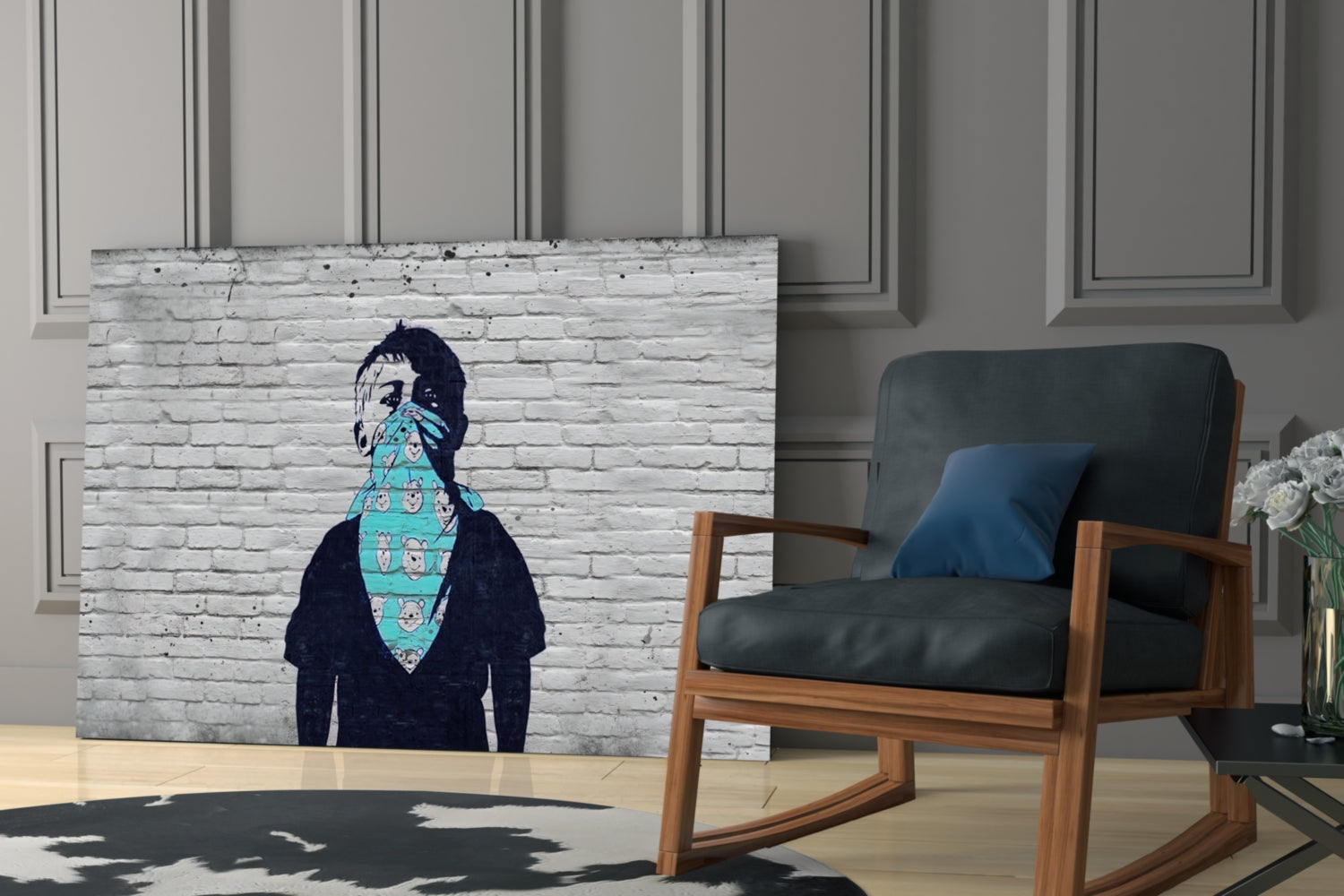 Canvas art depicting silhouetted figure with turquoise patterned fabric covering lower face, displayed in modern living room setting.
