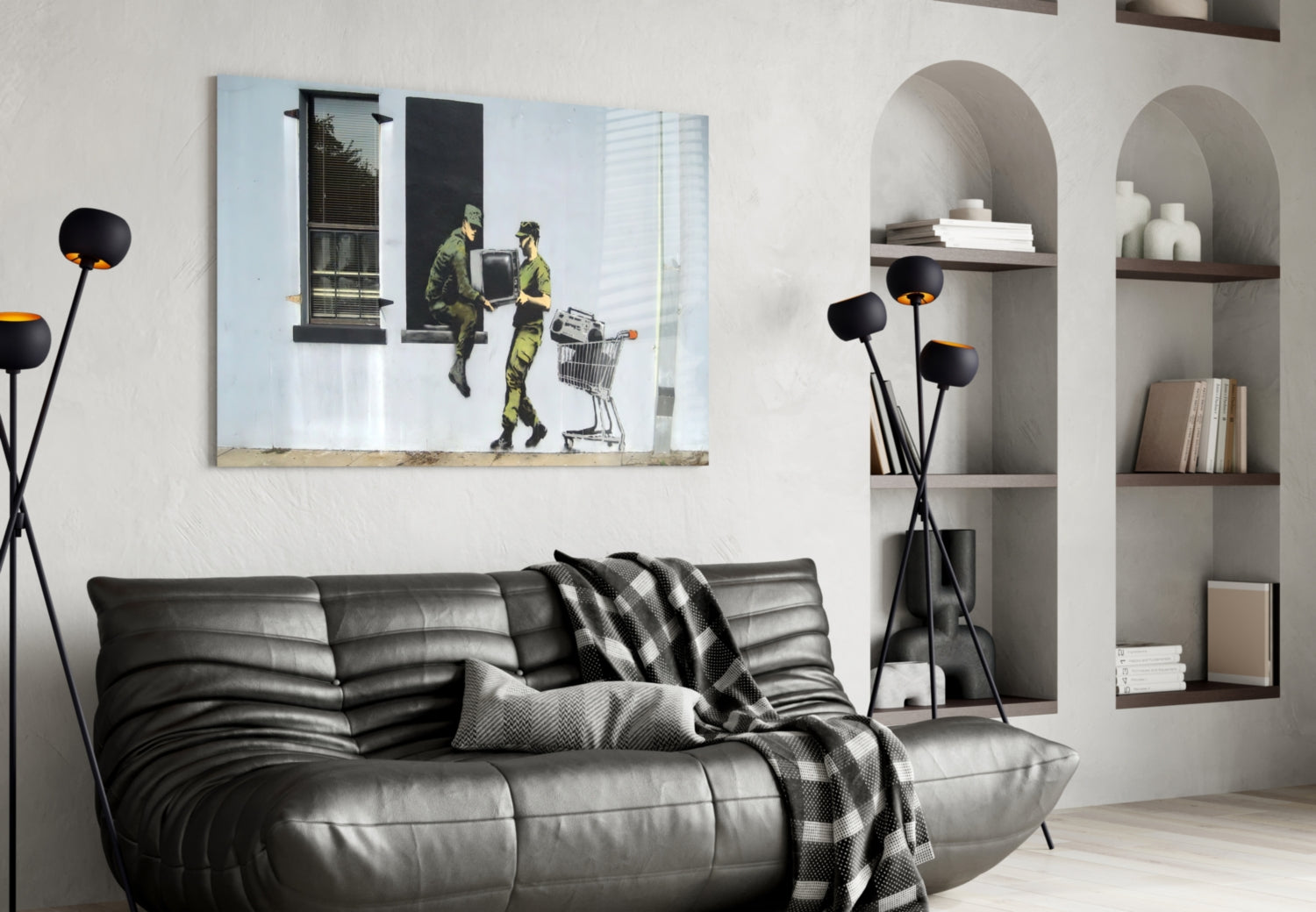 Soldier Glass Art canvas hung above black leather sofa in modern living room with arched shelving and floor lamp.