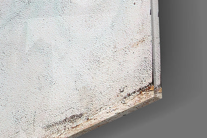 Close-up edge view of textured white and tan speckled glass panel against gray background, showing beveled corner detail.