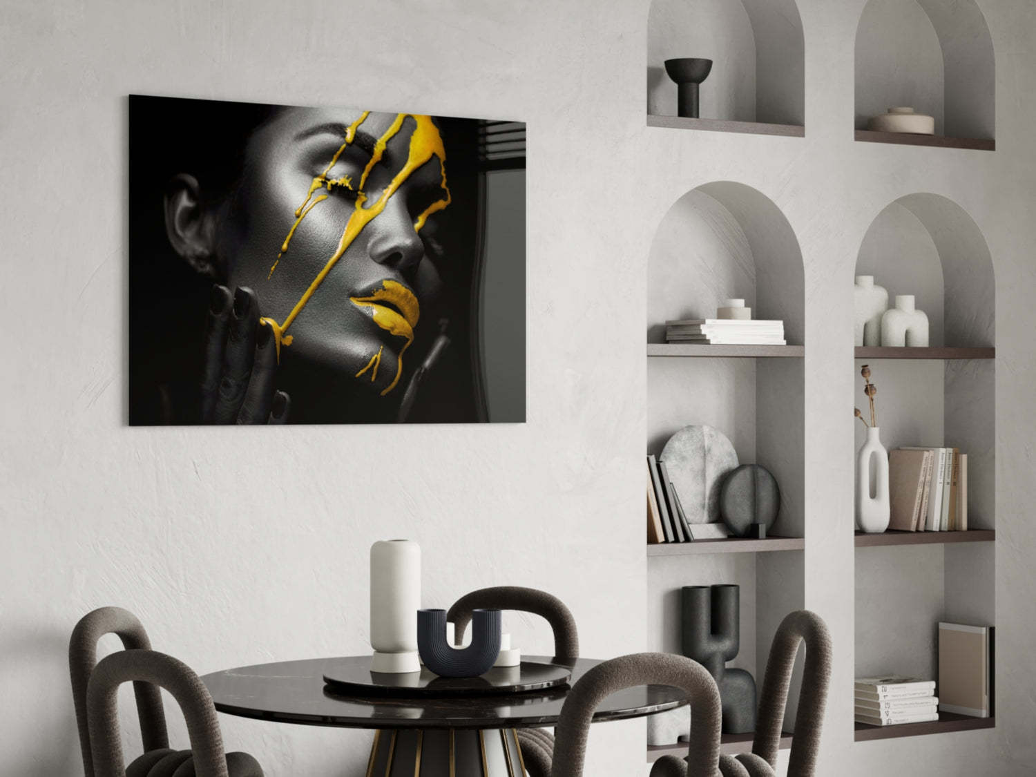 Yellow Paint Glass Art depicting a monochrome female face with bold yellow brushstroke details displayed in a modern dining room setting.