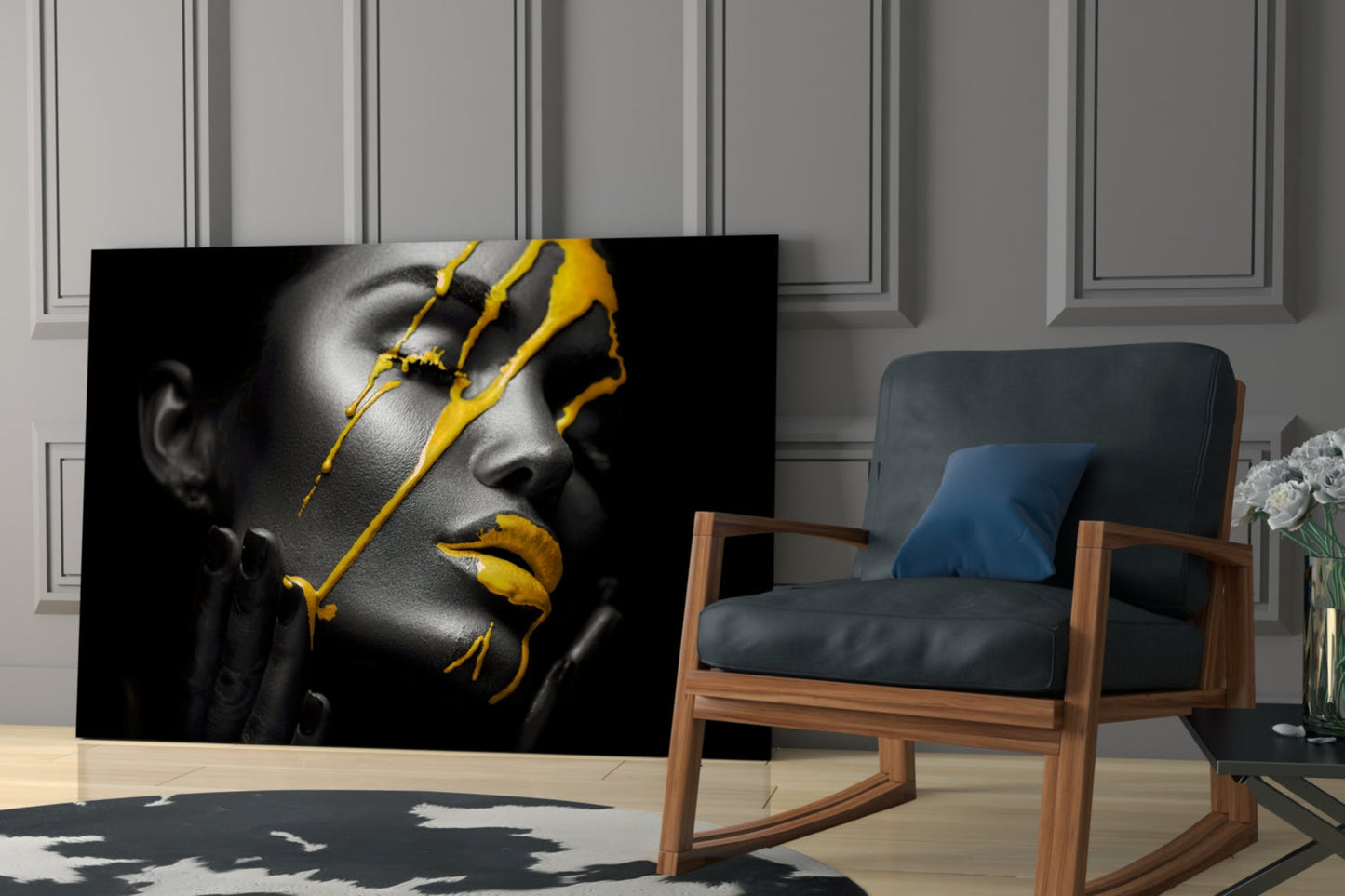 Black and white portrait with bold yellow paint strokes across face and lips, displayed in modern living room setting.