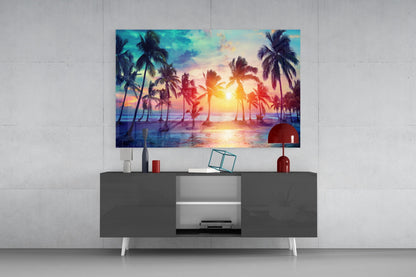 Tropical sunset glass art with palm trees and golden light displayed above a gray media console in a modern living room setting.