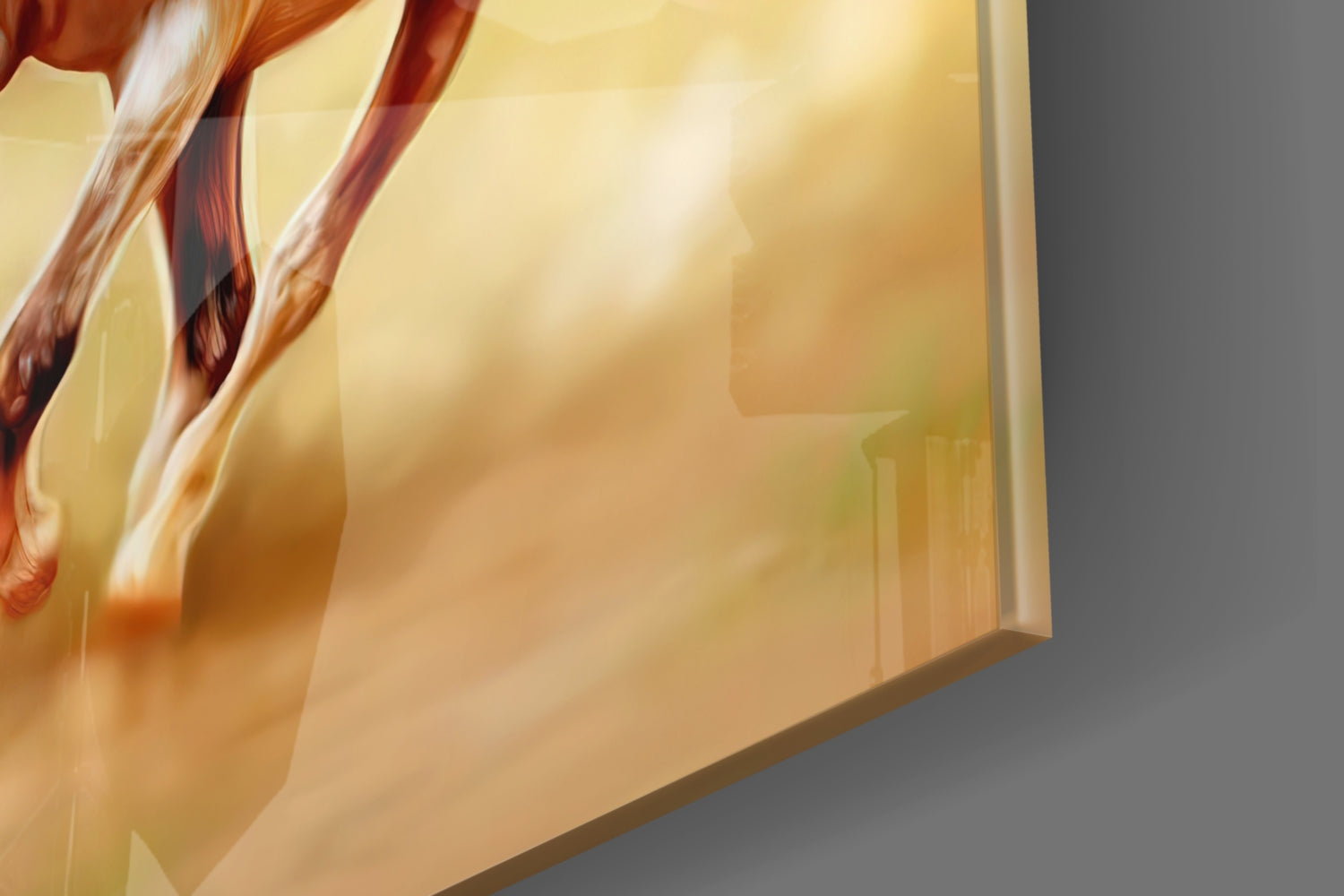 Close-up of running horses glass art showing muscular legs and hooves in warm amber and cream tones against soft yellow background.