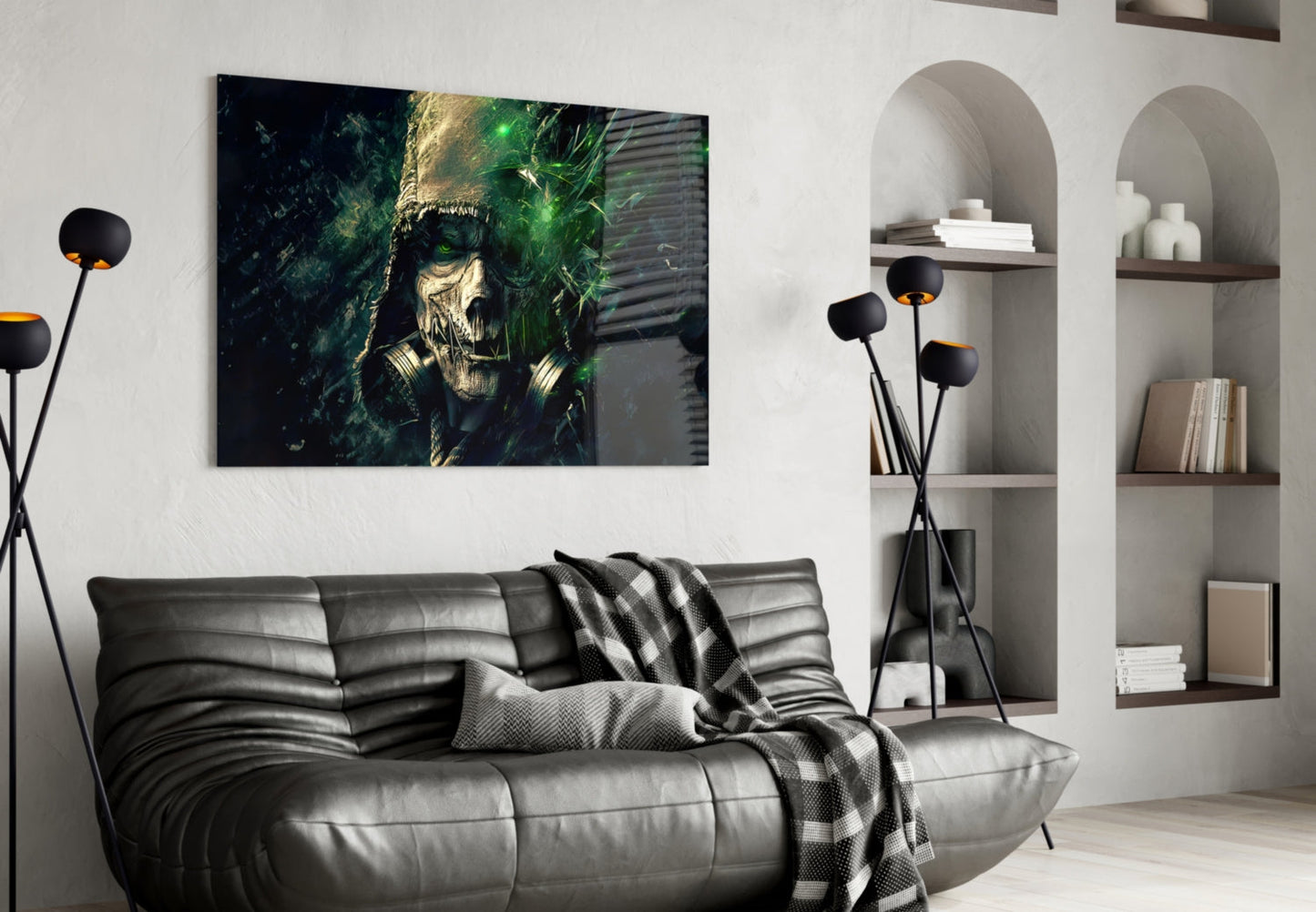 Modern living room with black leather sofa, wall-mounted artwork featuring skull design, and arched alcove shelving with white decorative objects.