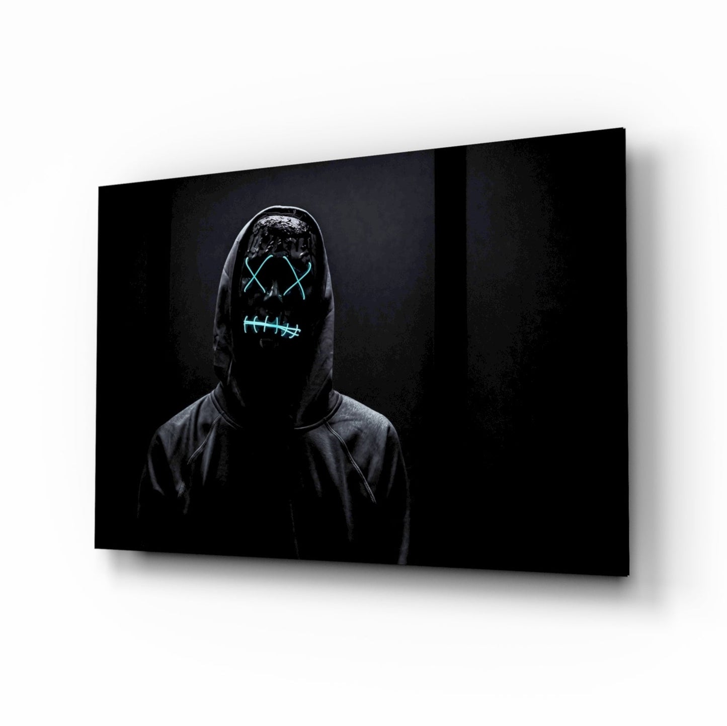 Figure in dark hoodie wearing neon cyan glowing mask with X eyes and stitched mouth design on black background.